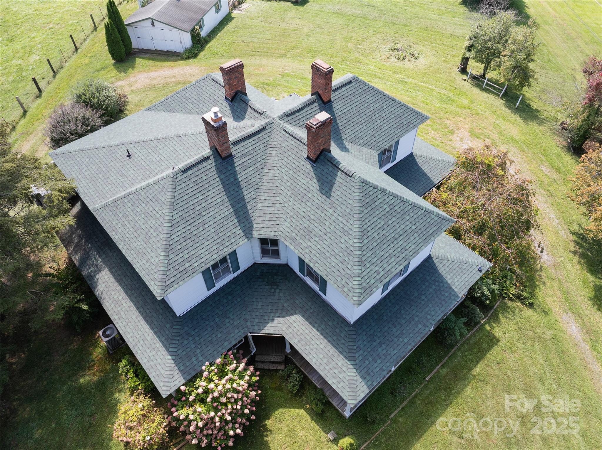 4912 Pigeon Road Waynesville, NC 28786 - Photo 7 of 38 an aerial view of houses with deck