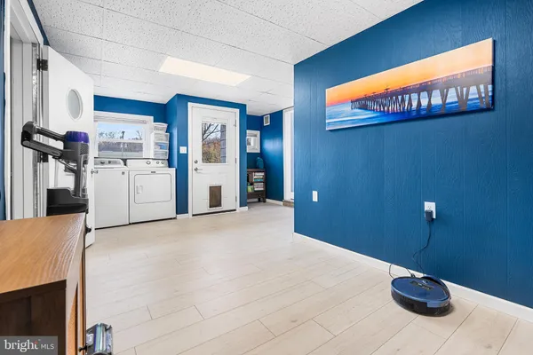 a workspace with furniture and a kitchen