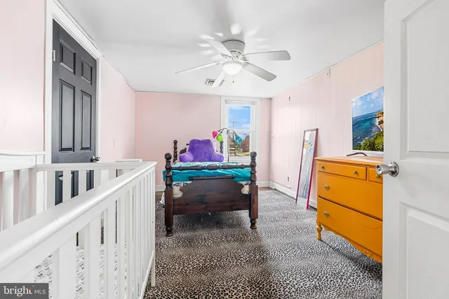 a room with furniture and a chandelier