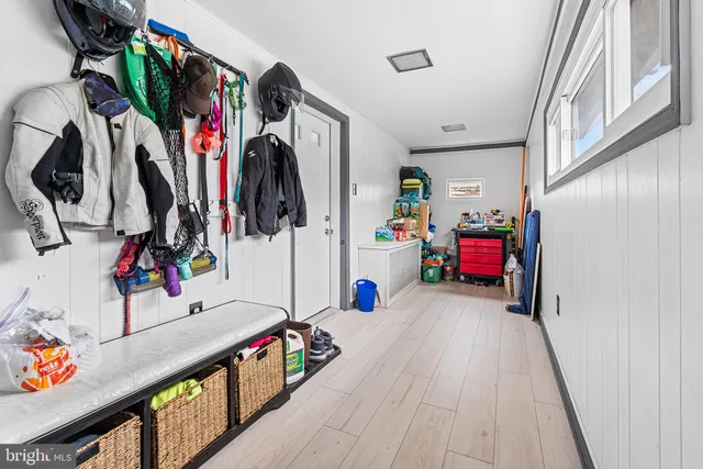 a view of a hallway with lots of stuff and toys
