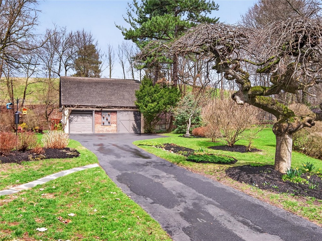 1608 Highland Avenue Rochester, NY 14618 - Photo 46 of 48 Driveway to garage with turnaround