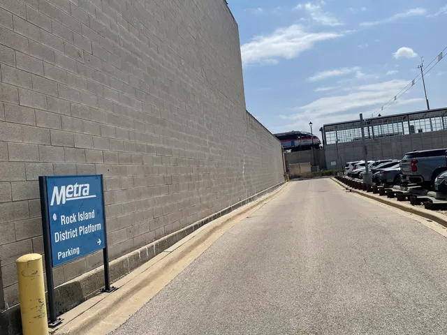 a view of a street with car parked