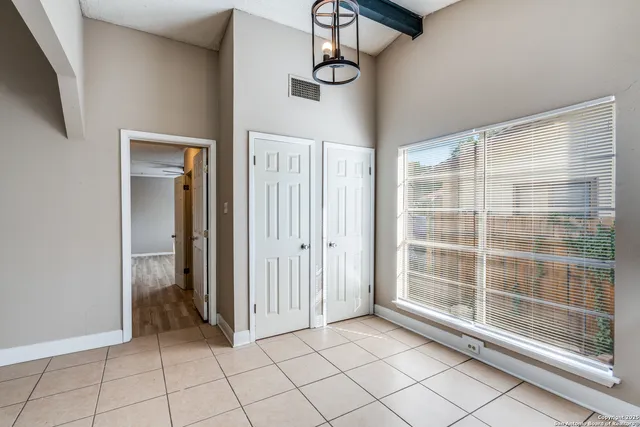 a view of a room with windows