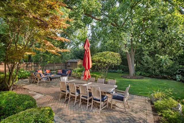 a view of a sitting area with furniture and garden