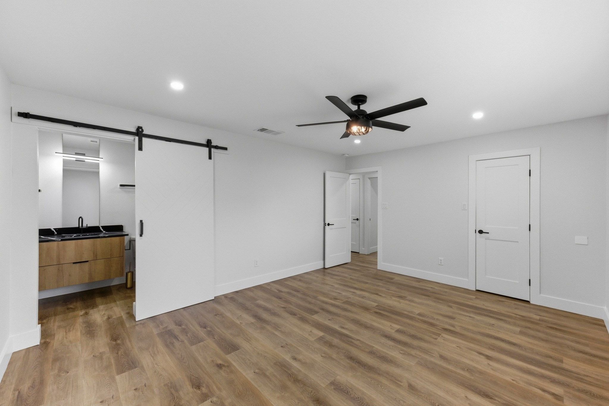 3817 Leafield Drive Austin, TX 78749 - Photo 18 of 31 a living room with stainless steel appliances furniture and a ceiling fan
