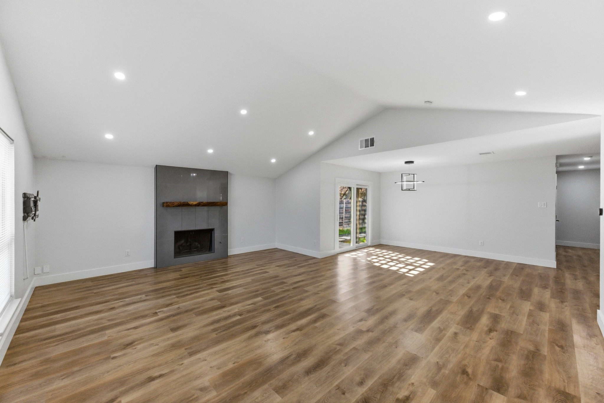 3817 Leafield Drive Austin, TX 78749 - Photo 6 of 31 a view of an empty room with a fireplace