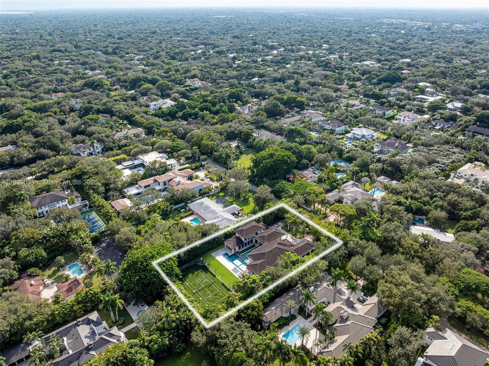 8961 Southwest 62nd Court Pinecrest, FL 33156 - Photo 64 of 72 an aerial view of residential houses with city view