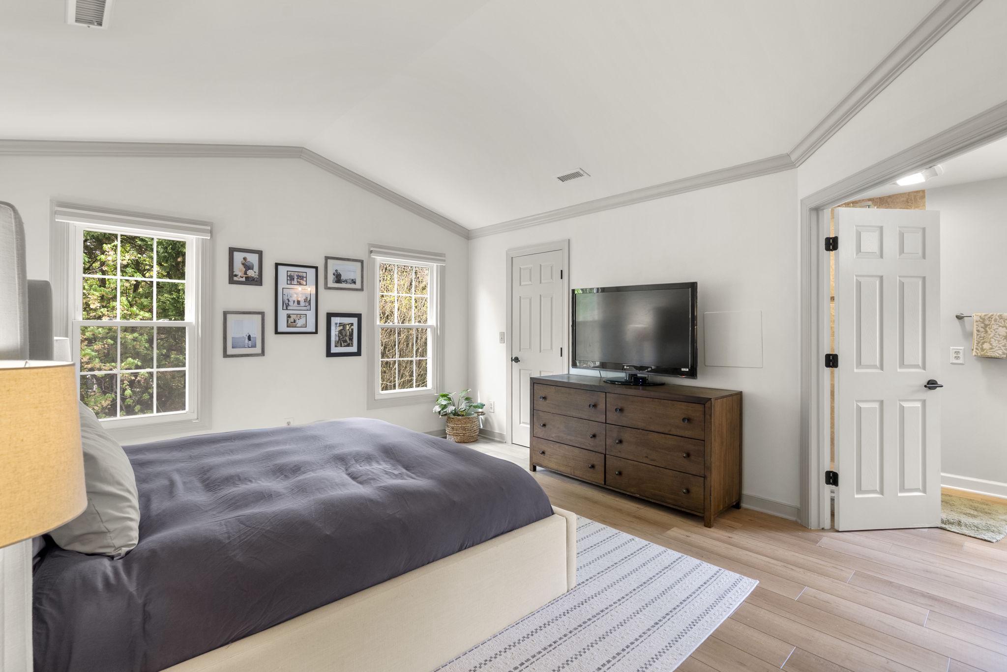 2730 Howard Grove Road Davidsonville, MD 21035 - Photo 26 of 68 Bright and inviting modern primary bedroom.