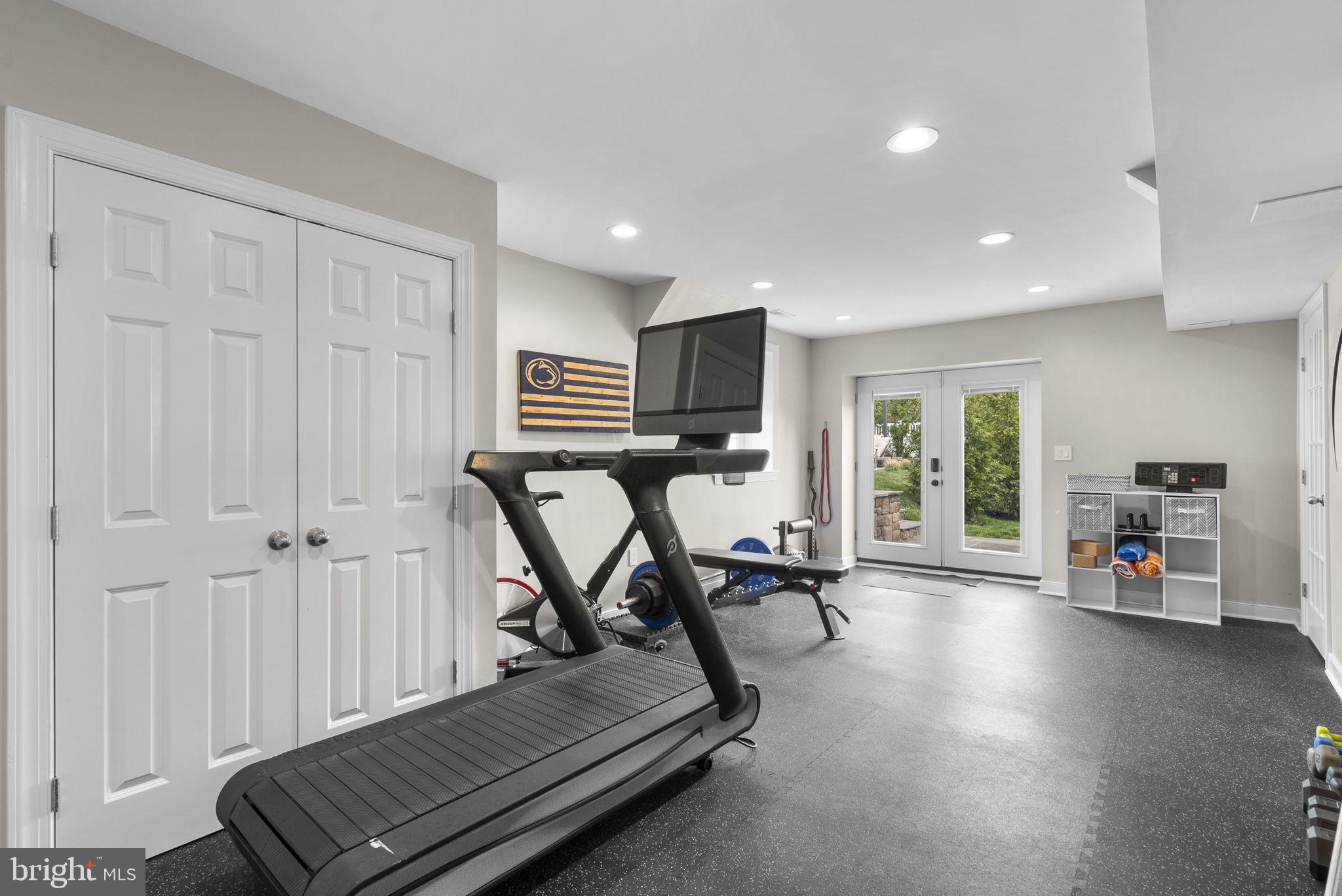 2730 Howard Grove Road Davidsonville, MD 21035 - Photo 42 of 68 Modern home gym with natural light.