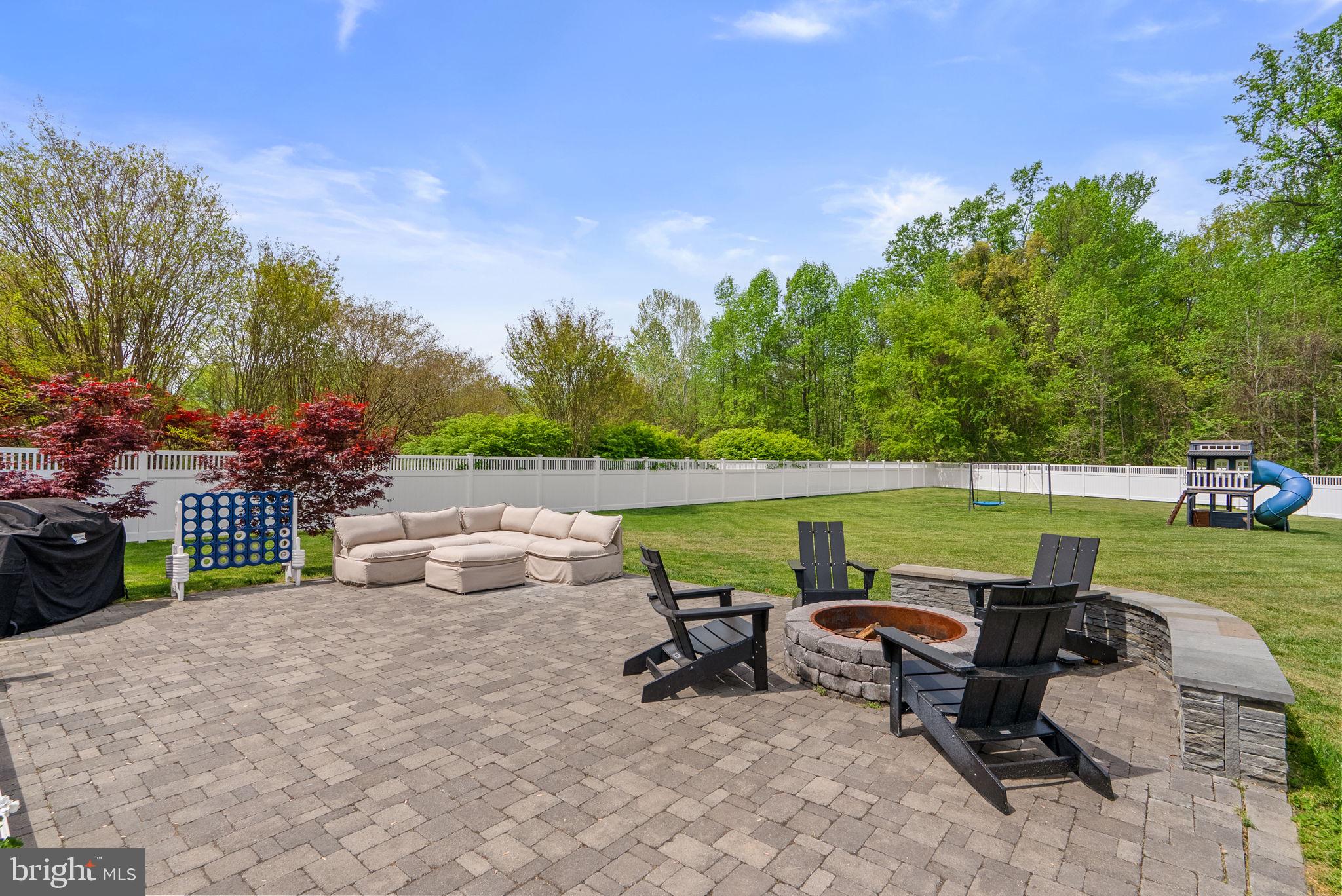 2730 Howard Grove Road Davidsonville, MD 21035 - Photo 50 of 68 Serene backyard retreat with fire pit.