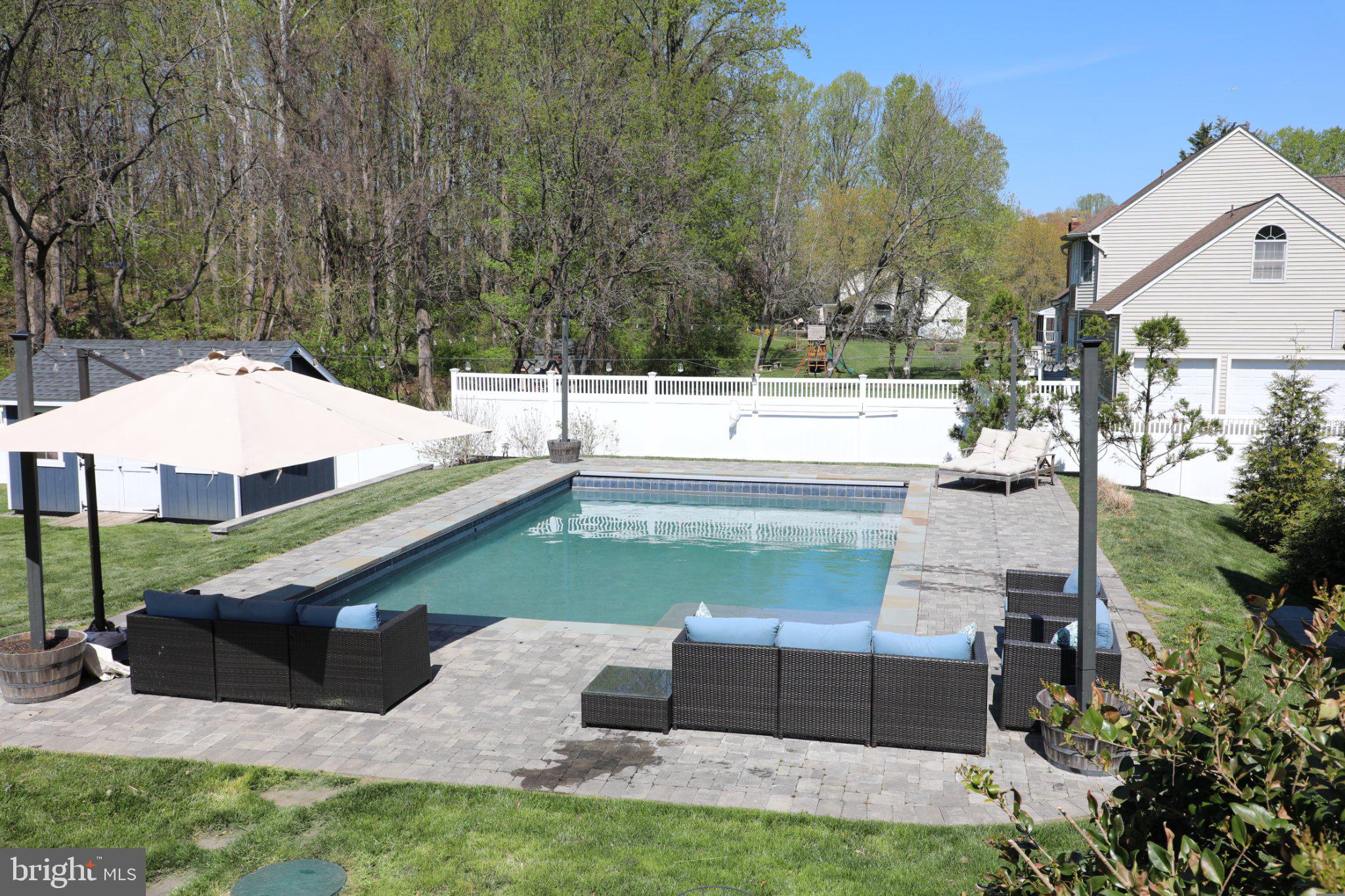 2730 Howard Grove Road Davidsonville, MD 21035 - Photo 53 of 68 Serene backyard oasis with pool