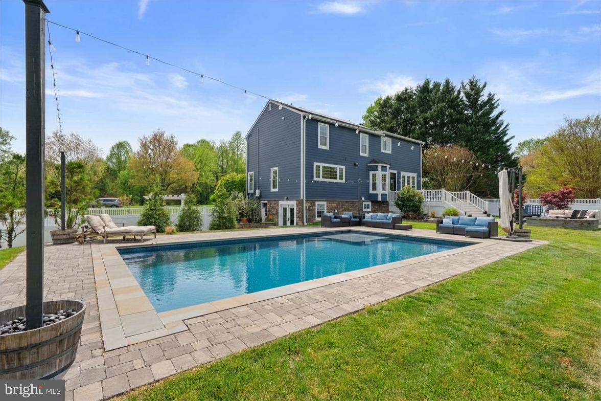 2730 Howard Grove Road Davidsonville, MD 21035 - Photo 54 of 68 Serene backyard oasis with pool.