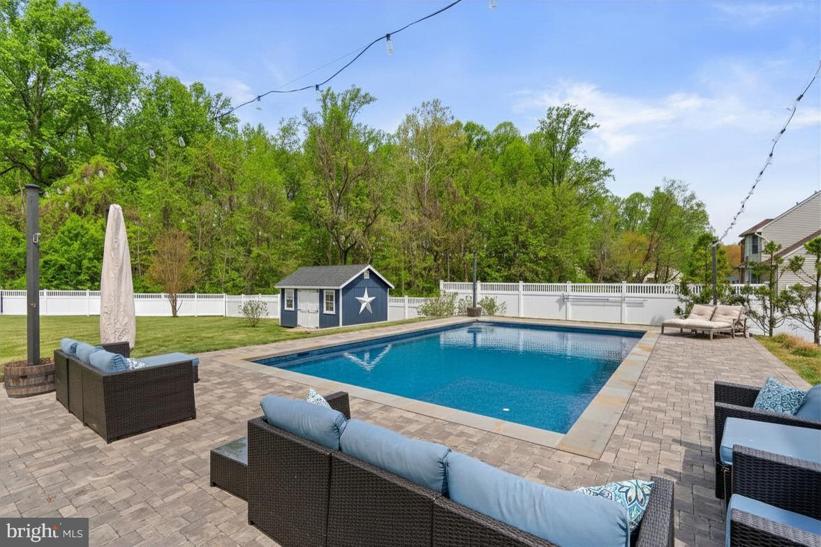 2730 Howard Grove Road Davidsonville, MD 21035 - Photo 55 of 68 Serene backyard oasis with pool.