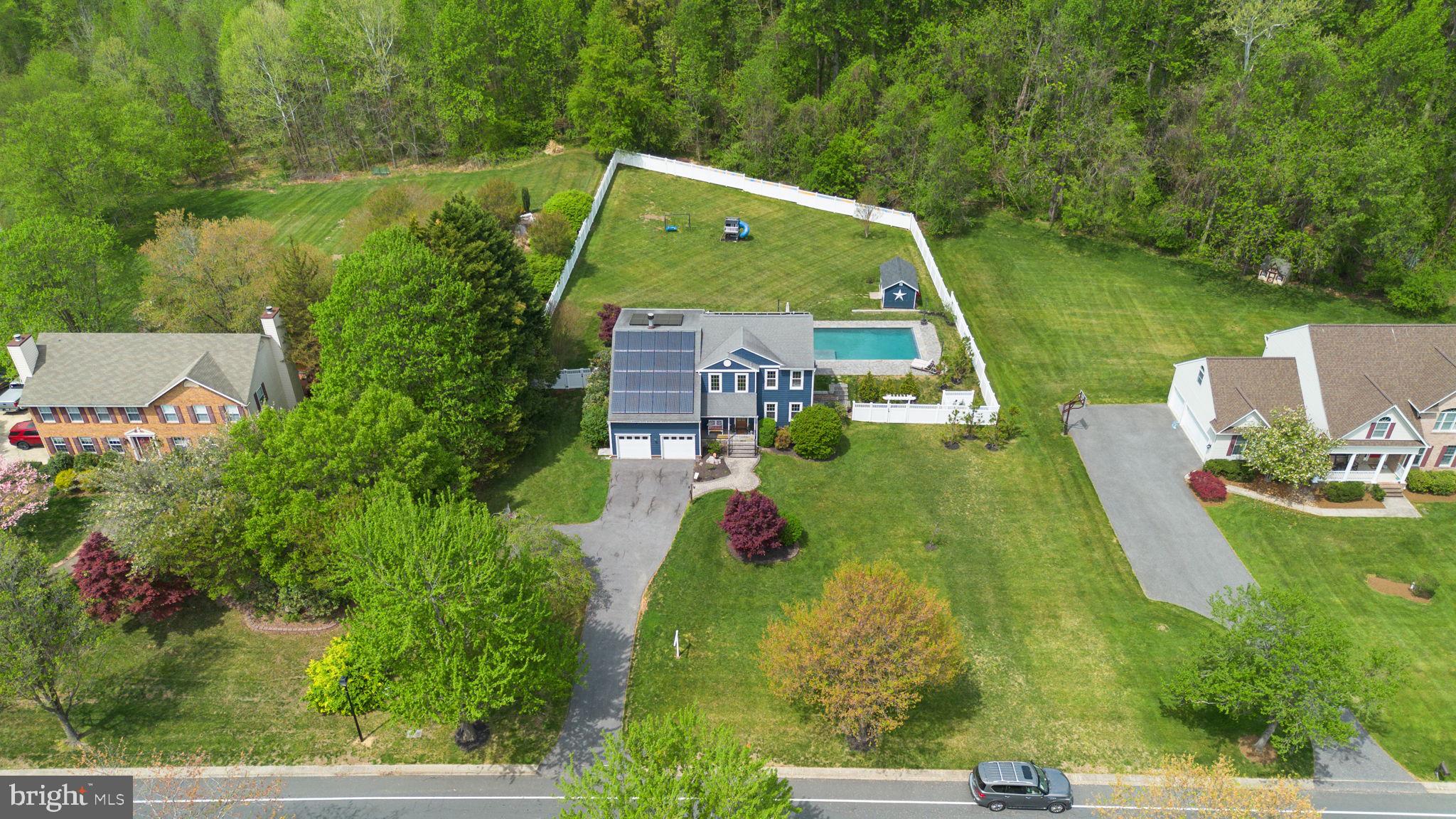 2730 Howard Grove Road Davidsonville, MD 21035 - Photo 59 of 68 Charming home with lush greenery.