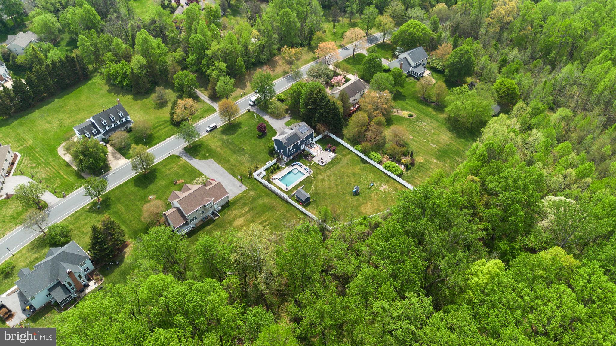 2730 Howard Grove Road Davidsonville, MD 21035 - Photo 63 of 68 Lush greenery surrounds serene homes.