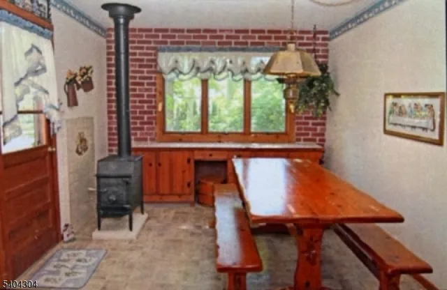 a balcony with table and chairs