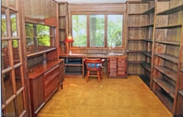 a room with furniture and a window