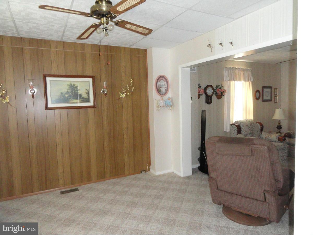 5504 Morello Road Baltimore, MD 21214 - Photo 2 of 24 Living Room off Foyer with Dining Room at Right