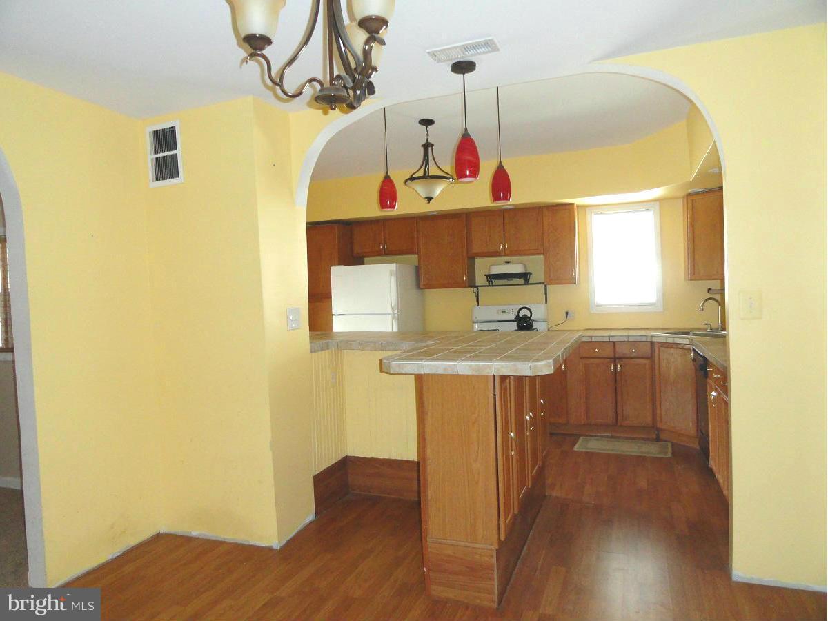 5504 Morello Road Baltimore, MD 21214 - Photo 15 of 24 Second Kitchen and Dining/Family Room Areas
