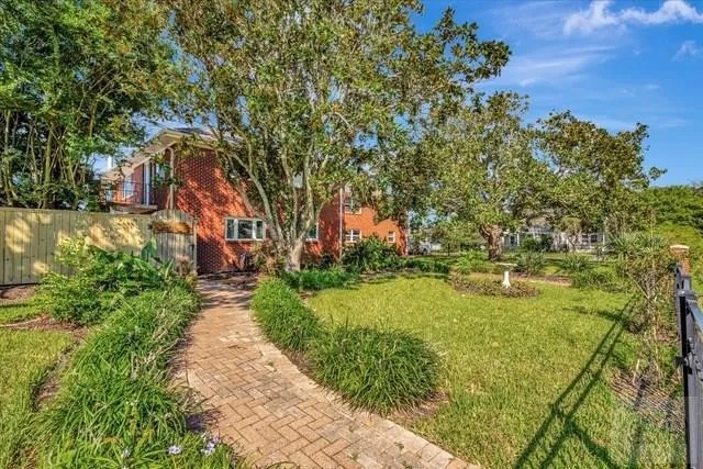 a view of a garden with an outdoor space