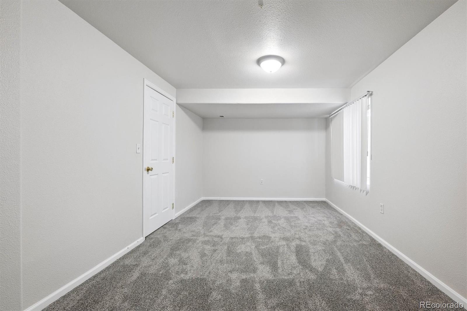 5241 Helena Street Denver, CO 80239 - Photo 20 of 28 a view of empty room