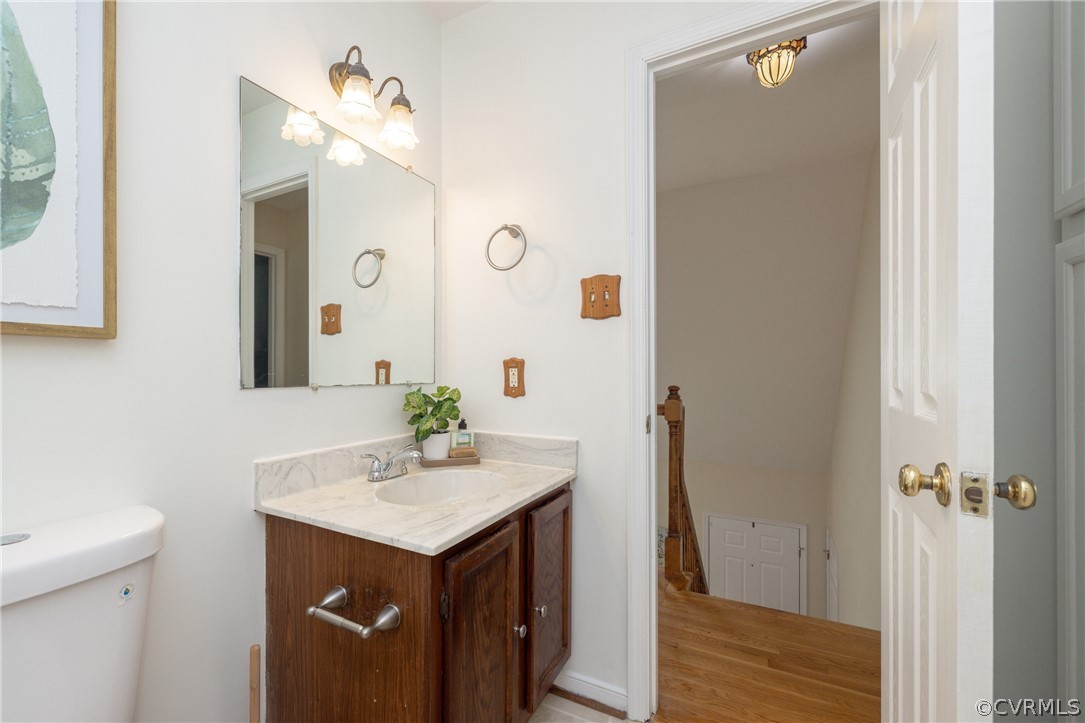 12000 Quito Road Midlothian, VA 23112 - Photo 25 of 36 a bathroom with a sink and a mirror