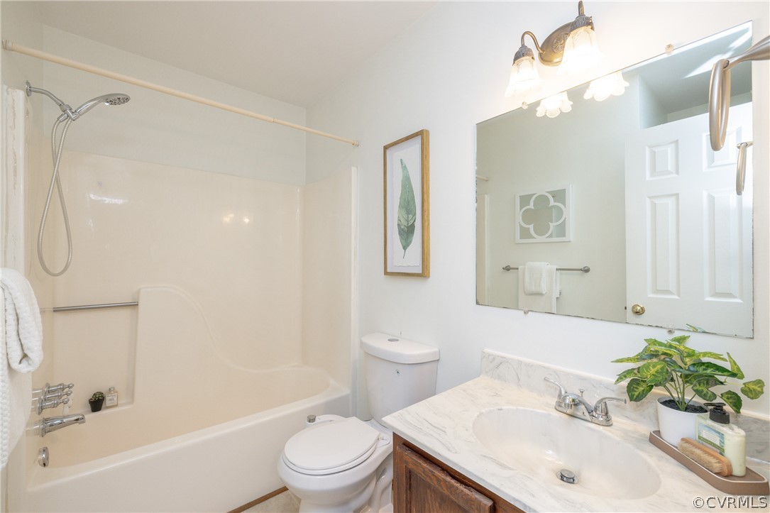12000 Quito Road Midlothian, VA 23112 - Photo 28 of 36 a bathroom with a sink a toilet and shower