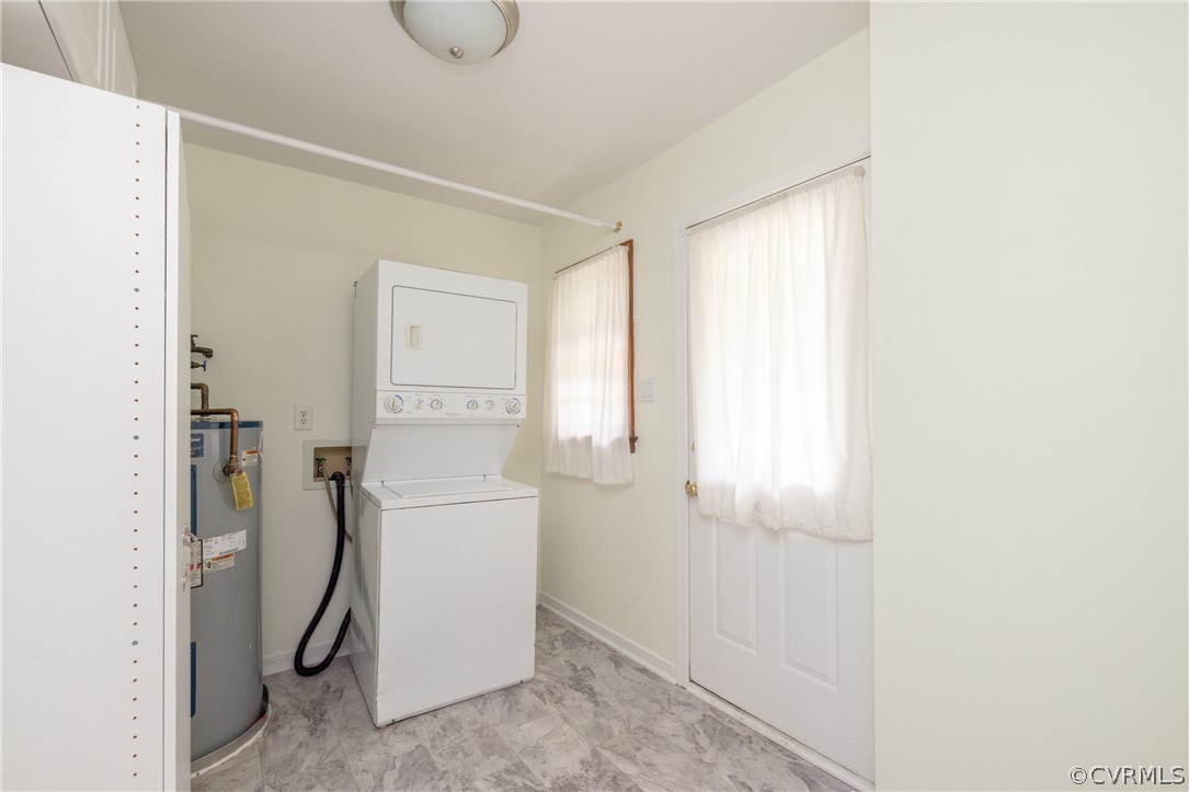 12000 Quito Road Midlothian, VA 23112 - Photo 30 of 36 a utility room with cabinets washer and dryer