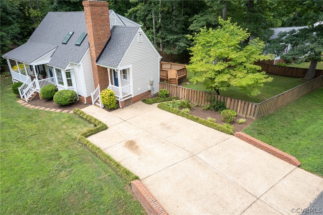 12000 Quito Road Midlothian, VA 23112 - Photo 3 of 36 a front view of a house with a yard