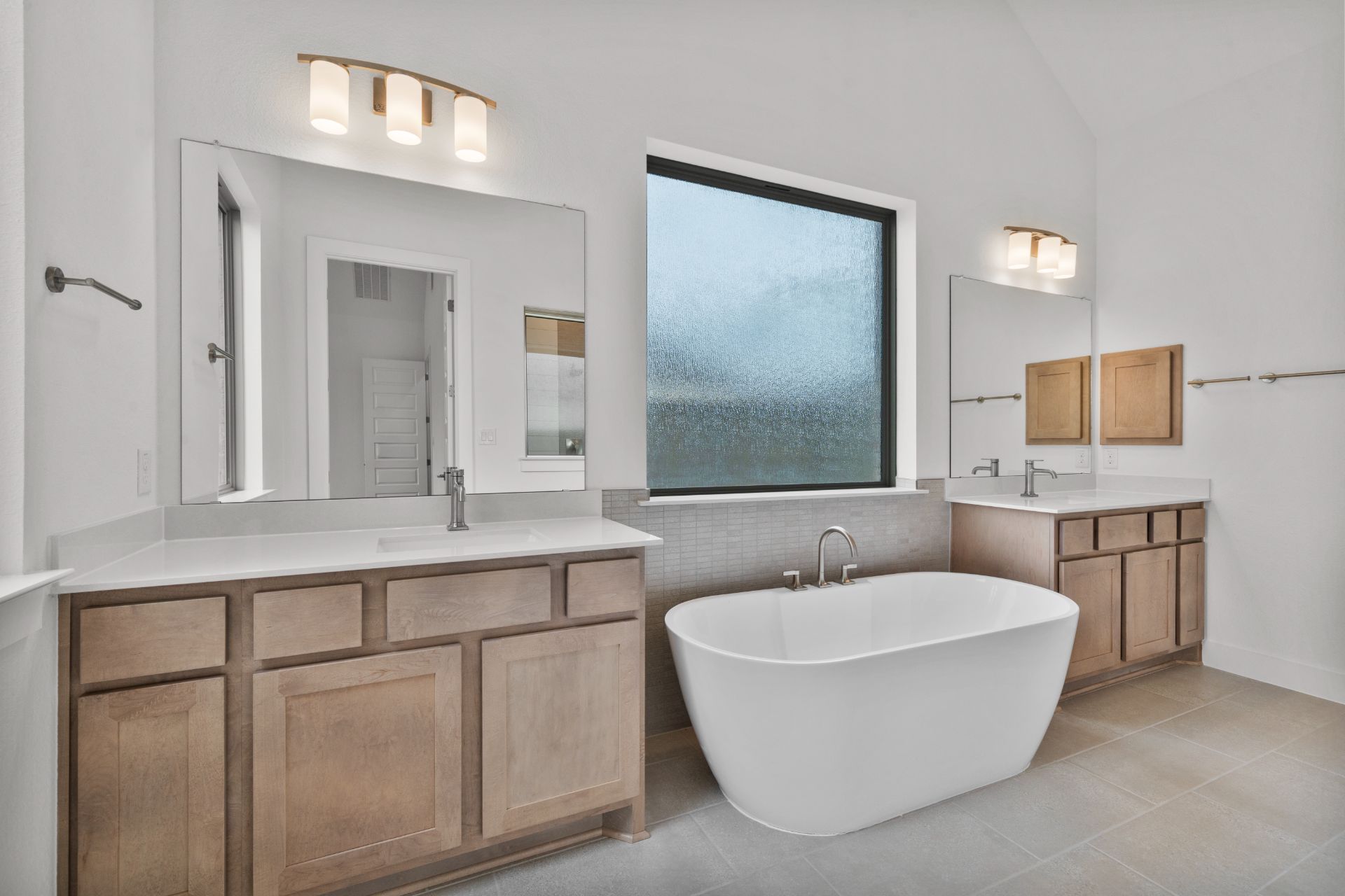 1802 Crimson Sunset Drive Georgetown, TX 78628 - Photo 18 of 38 Primary Bath retreat with dual vanities & soaking tub