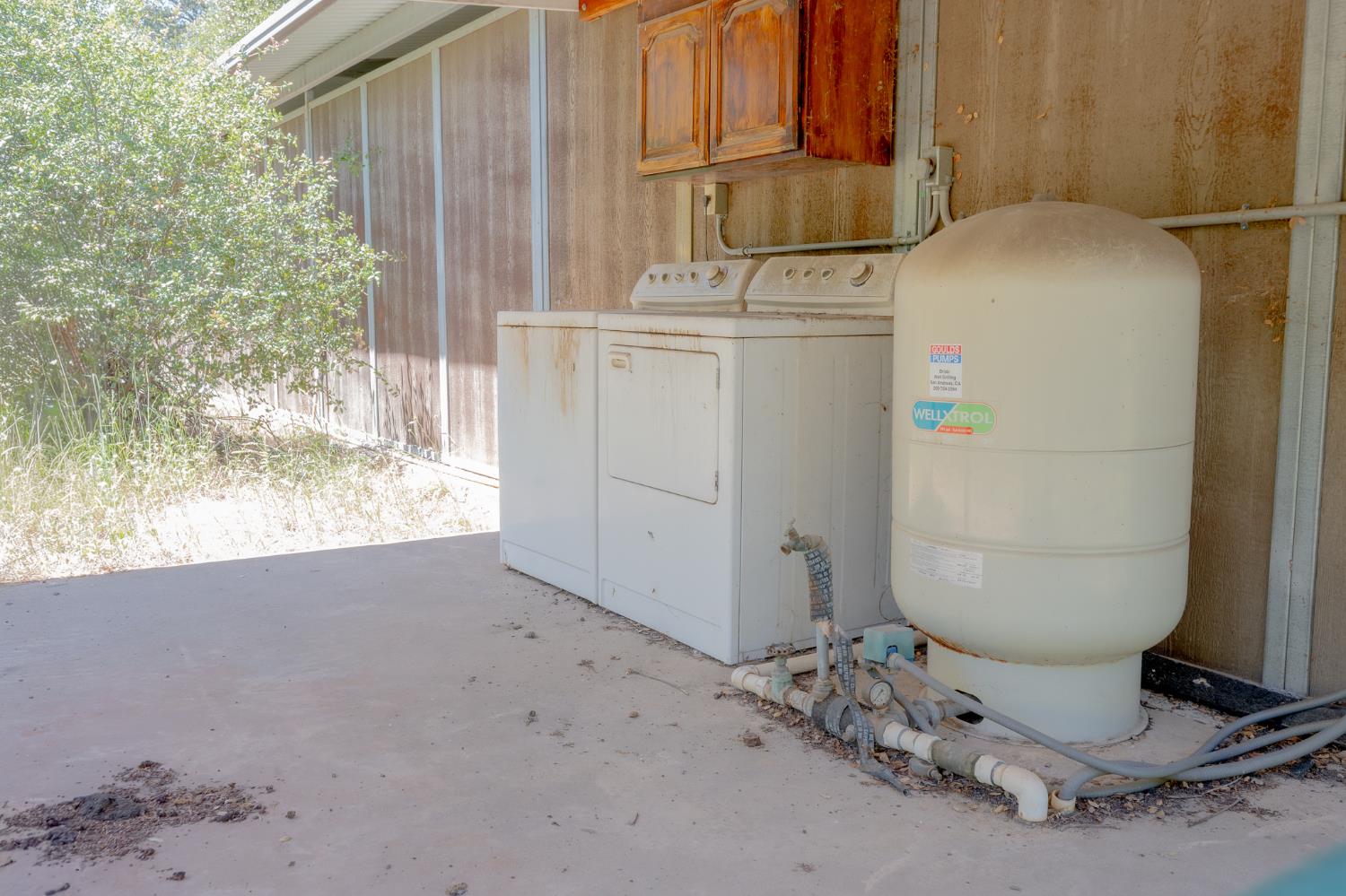 5912 Old Gulch Road San Andreas, CA 95249 - Photo 66 of 71 a room with water heater and appliances