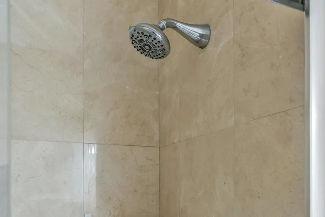 a view of a tall building from a balcony