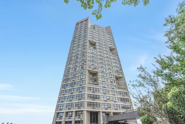 a view of a balcony and fire pit
