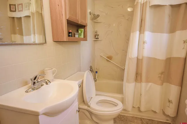 a bathroom with a sink and a shower