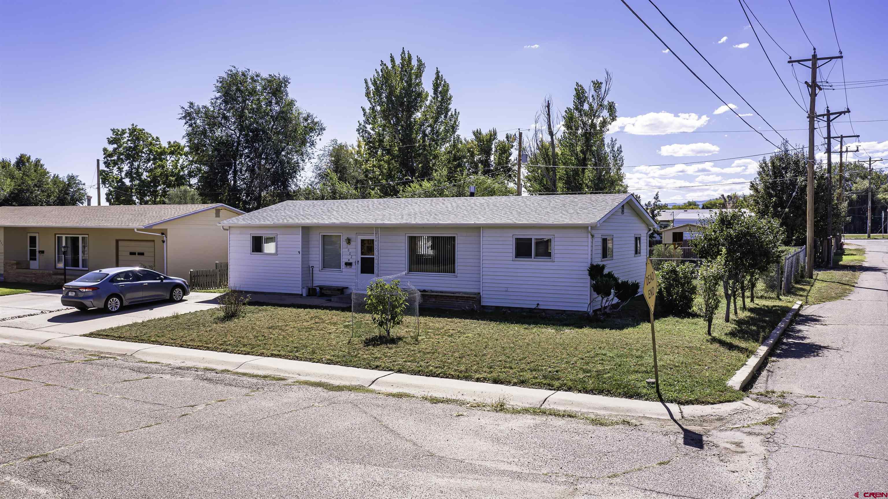 1002 East 2nd Street Florence, CO 81226 - Photo 2 of 44 a view of a house with a patio