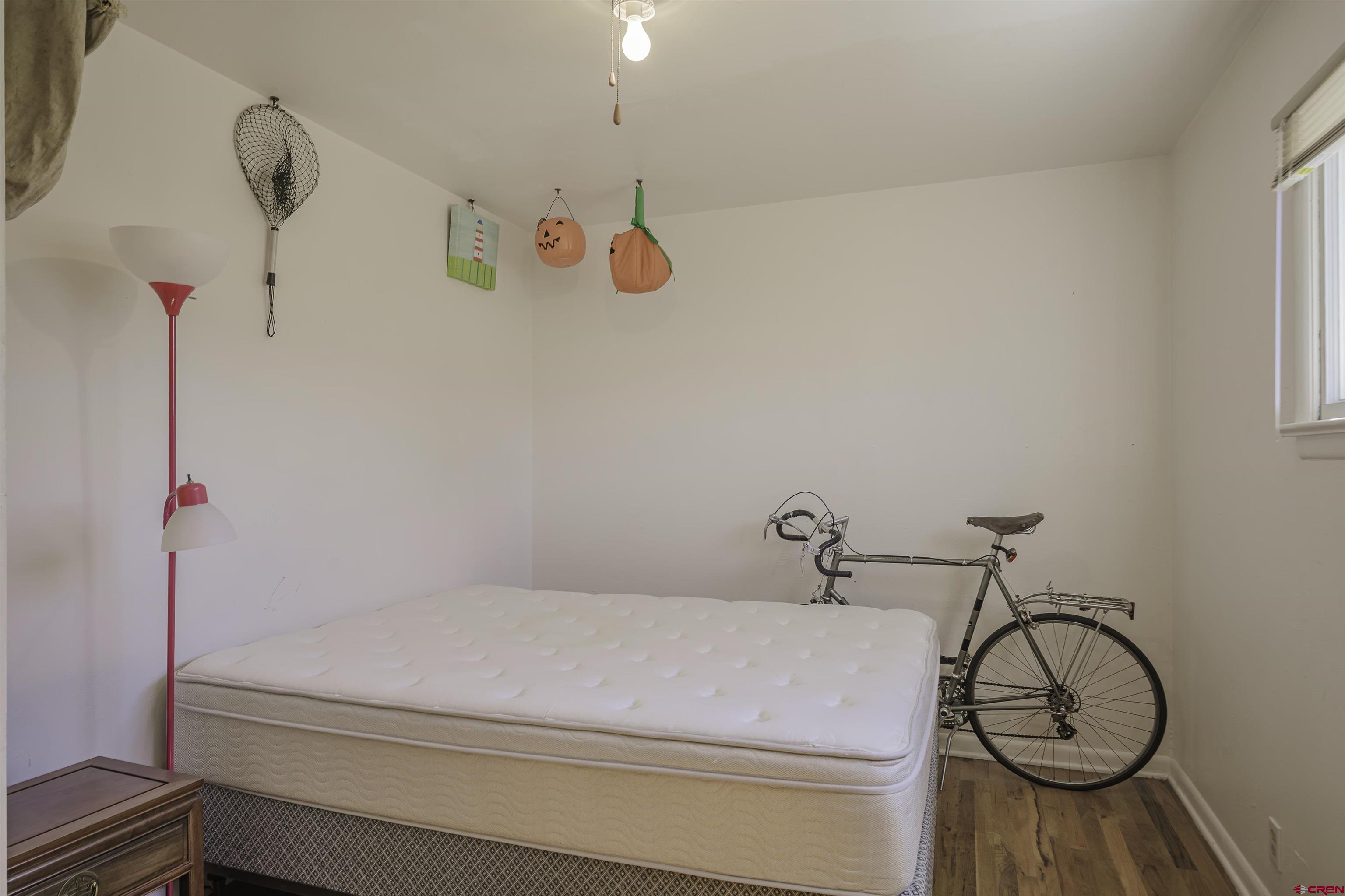 1002 East 2nd Street Florence, CO 81226 - Photo 24 of 44 a bathroom with a bathtub and shower