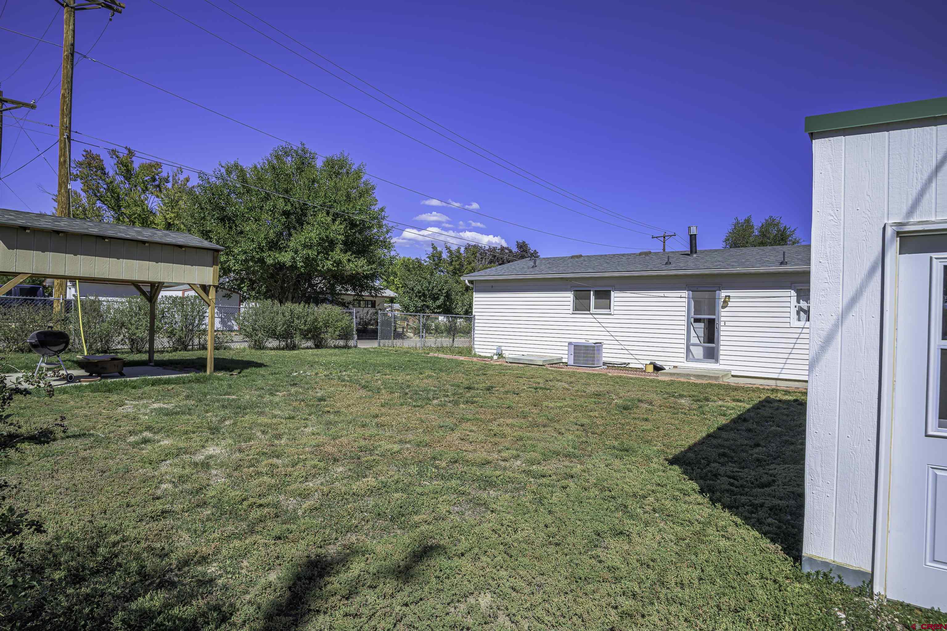 1002 East 2nd Street Florence, CO 81226 - Photo 37 of 44 a view of a house with backyard