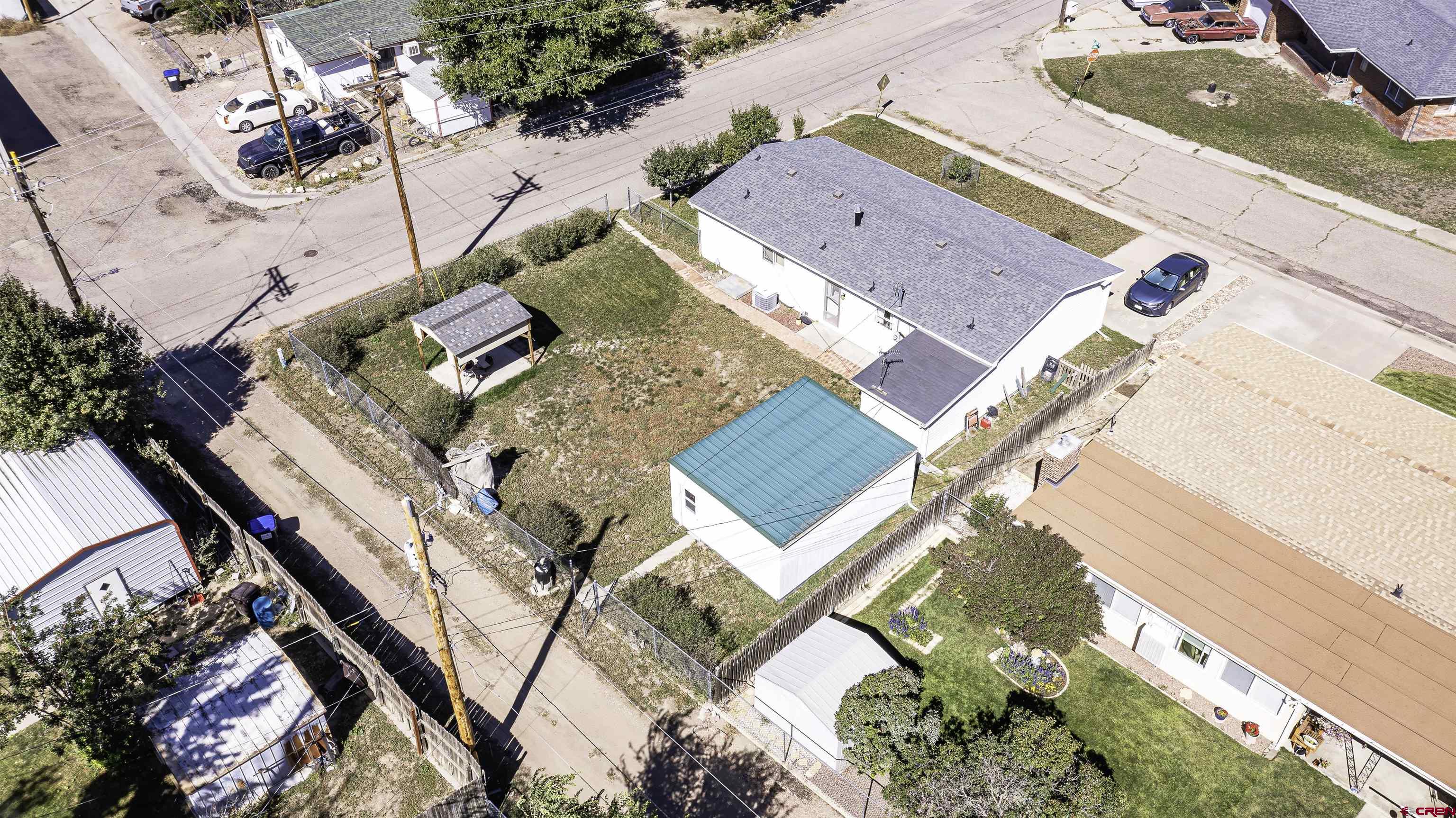 1002 East 2nd Street Florence, CO 81226 - Photo 43 of 44 an aerial view of a house with a yard