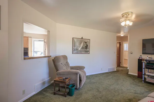 a living room with furniture and a couch
