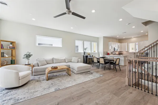 a living room with furniture and a table