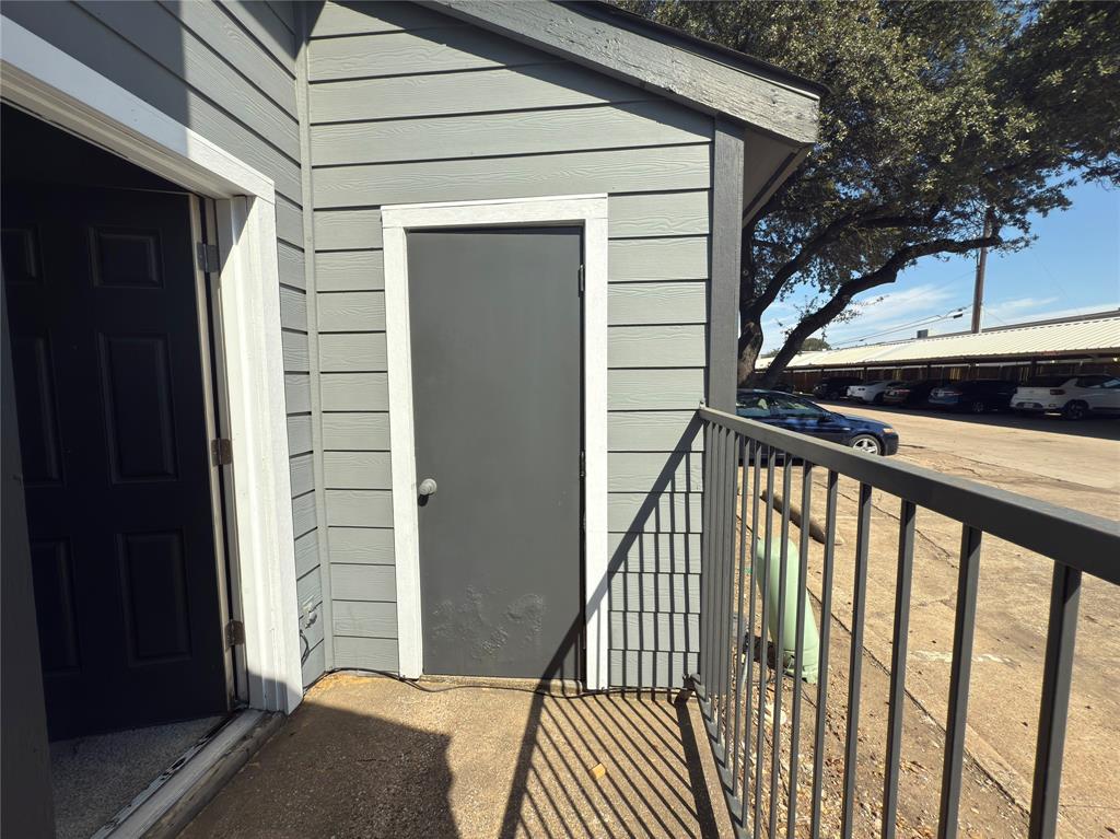 9696 Walnut Street, Unit 1108 Dallas, TX 75243 - Photo 18 of 19 a view of a wooden house with a window