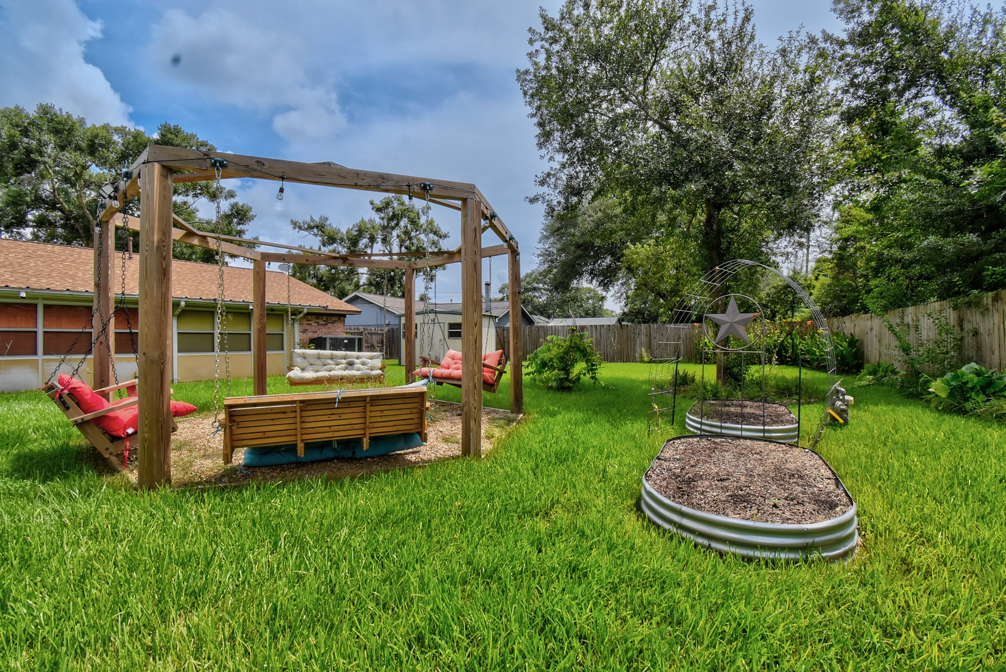 632 Northridge Street Angleton, TX 77515 - Photo 3 of 9 custom built pergola with swings