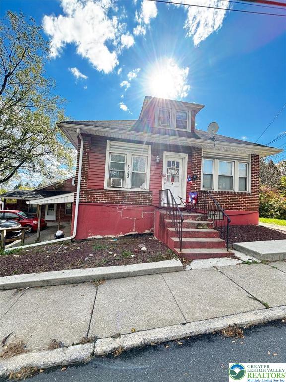 a view of a house with a porch