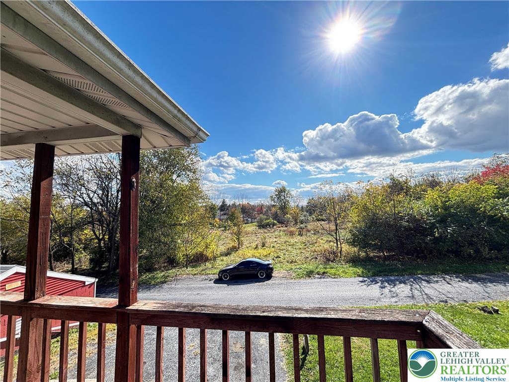 5562 Main Street, Unit 2 Whitehall, PA 18052 - Photo 17 of 19 a view of a balcony with furniture