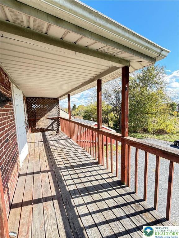 5562 Main Street, Unit 2 Whitehall, PA 18052 - Photo 18 of 19 a view of a balcony with wooden floor