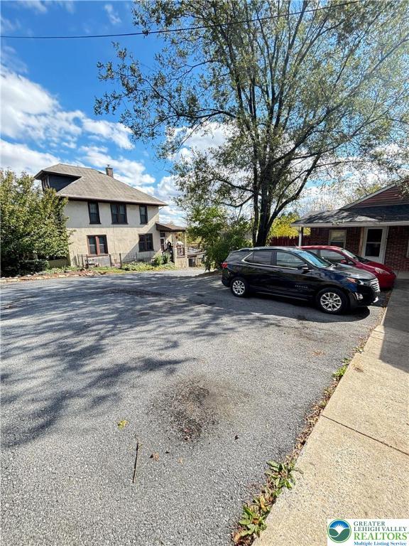 5562 Main Street, Unit 2 Whitehall, PA 18052 - Photo 19 of 19 a view of a car parked in front of a building