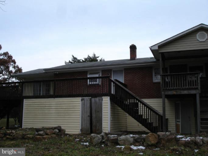 799 Catletts Ford Road Middletown, VA 22645 - Photo 14 of 15 a front view of a house with stairs