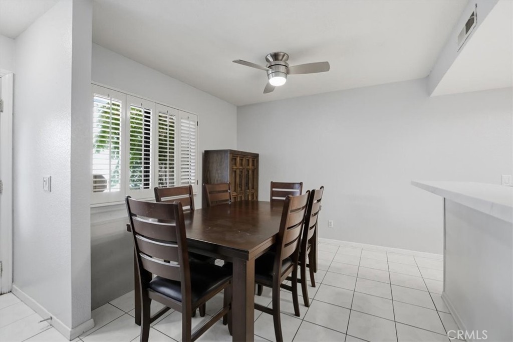 9743 La Jolla Drive, Unit D Rancho Cucamonga, CA 91701 - Photo 13 of 40 a view of a dining room with furniture