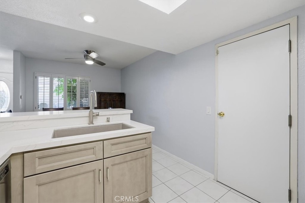 9743 La Jolla Drive, Unit D Rancho Cucamonga, CA 91701 - Photo 17 of 40 a bathroom with a sink and a mirror