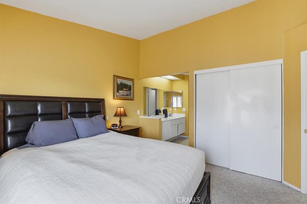 9743 La Jolla Drive, Unit D Rancho Cucamonga, CA 91701 - Photo 22 of 40 a bedroom with a bed and a closet